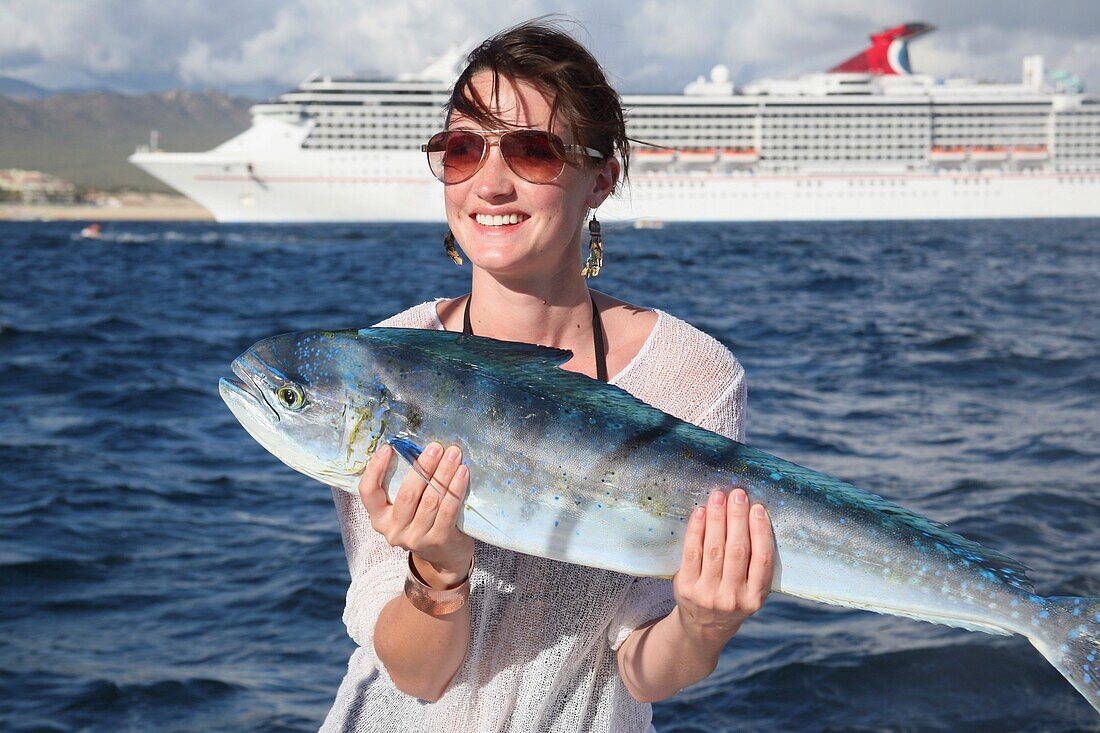 Woman Holding Large Fish, Cabo San Lucas, Mexico