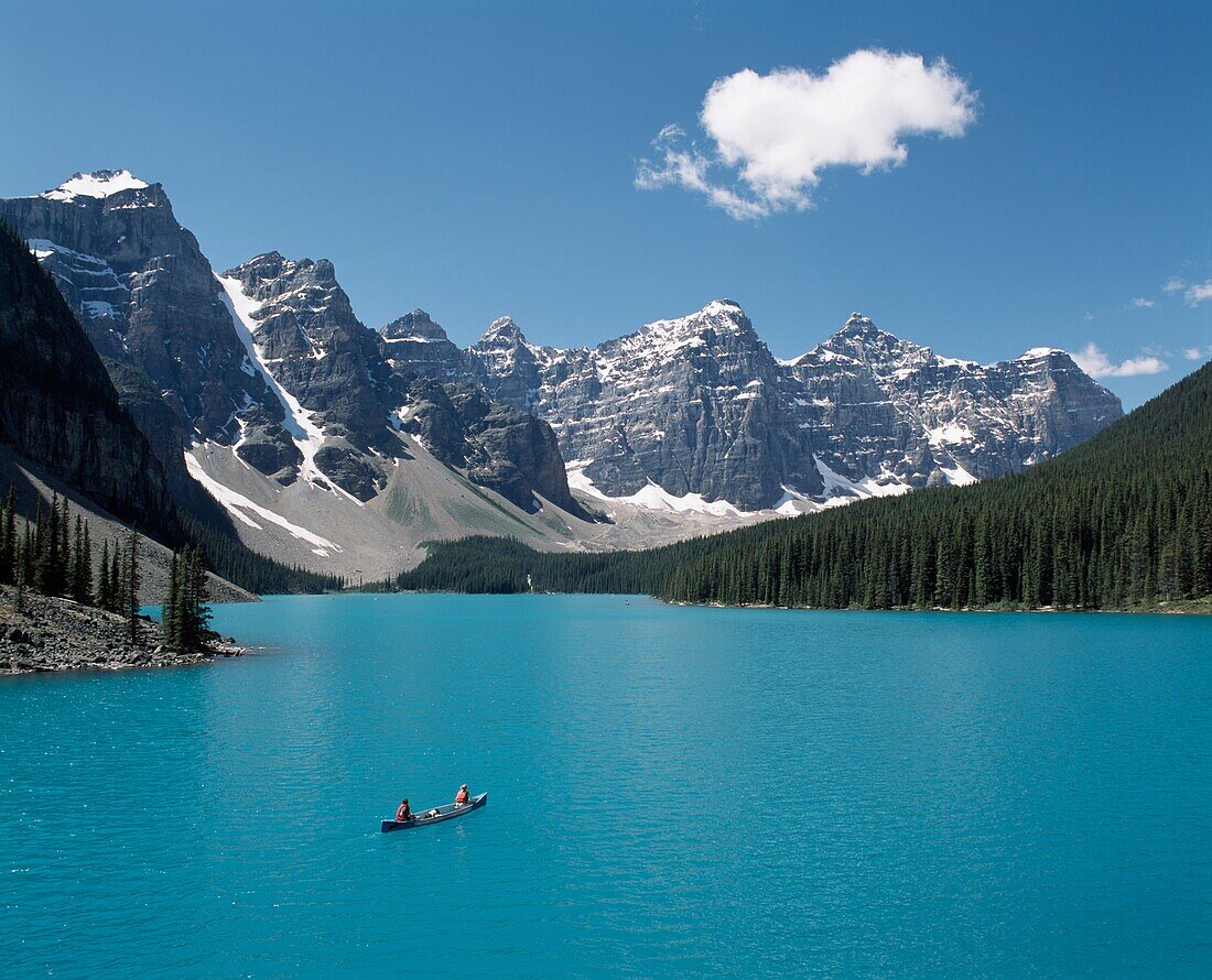 Canoeing On Moraine Lake, Banff National Park; Alberta, Canada