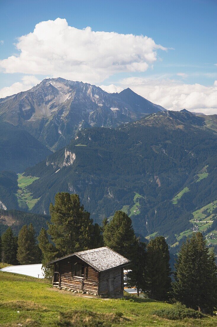 Wooden Alpine Hut In The Mountains