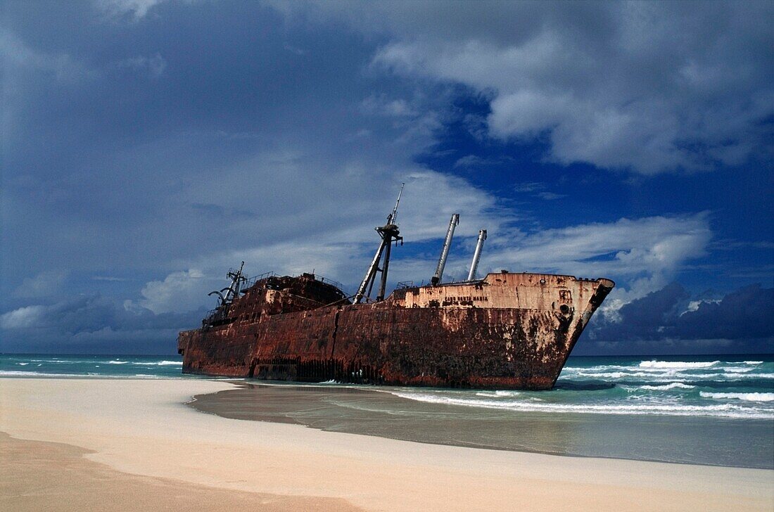 Shipwreck On A White Sand Beach