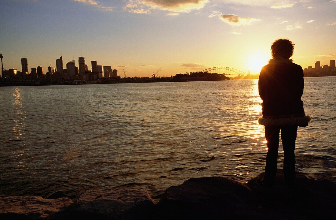 Woman Watching Sunset In Sydney Harbor