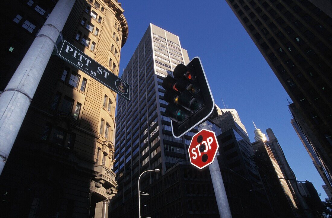 Skyscrapers, Stop Sign, And Traffic Light At Pitt Street, Low Angle View