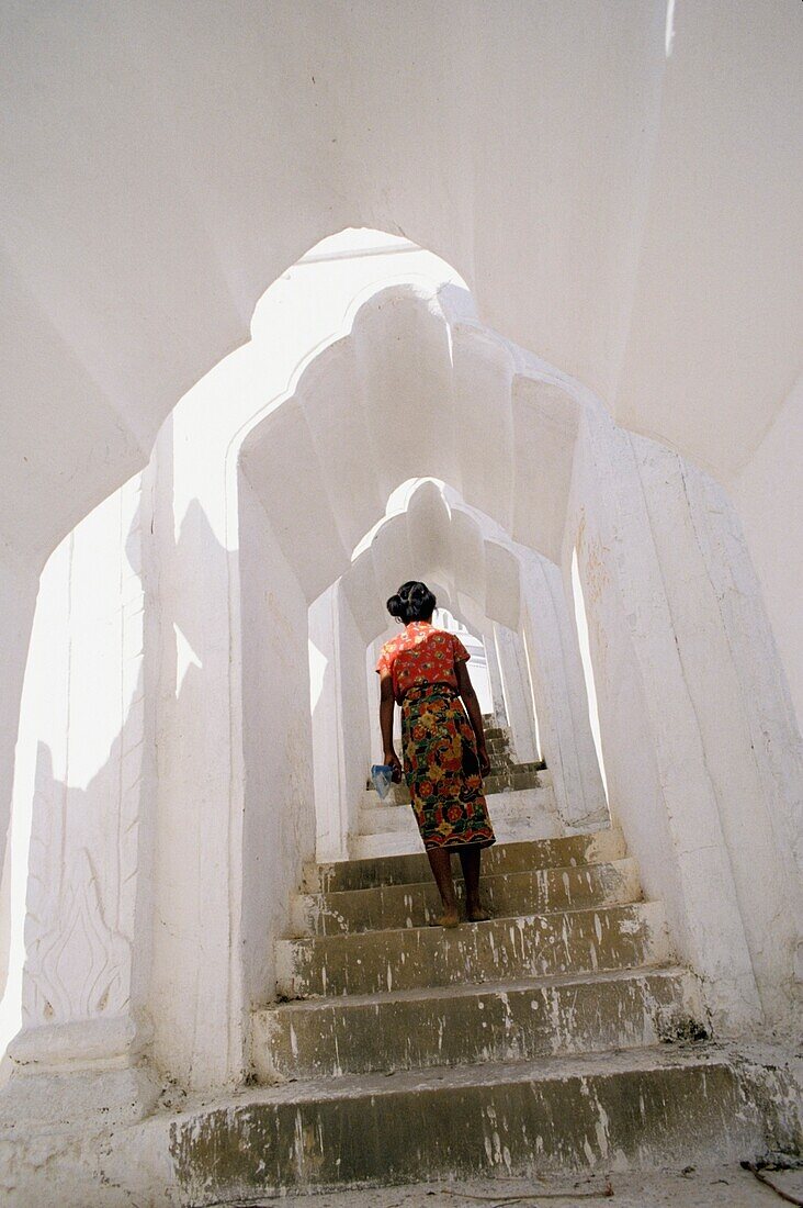 Woman Climbing Up Stairs