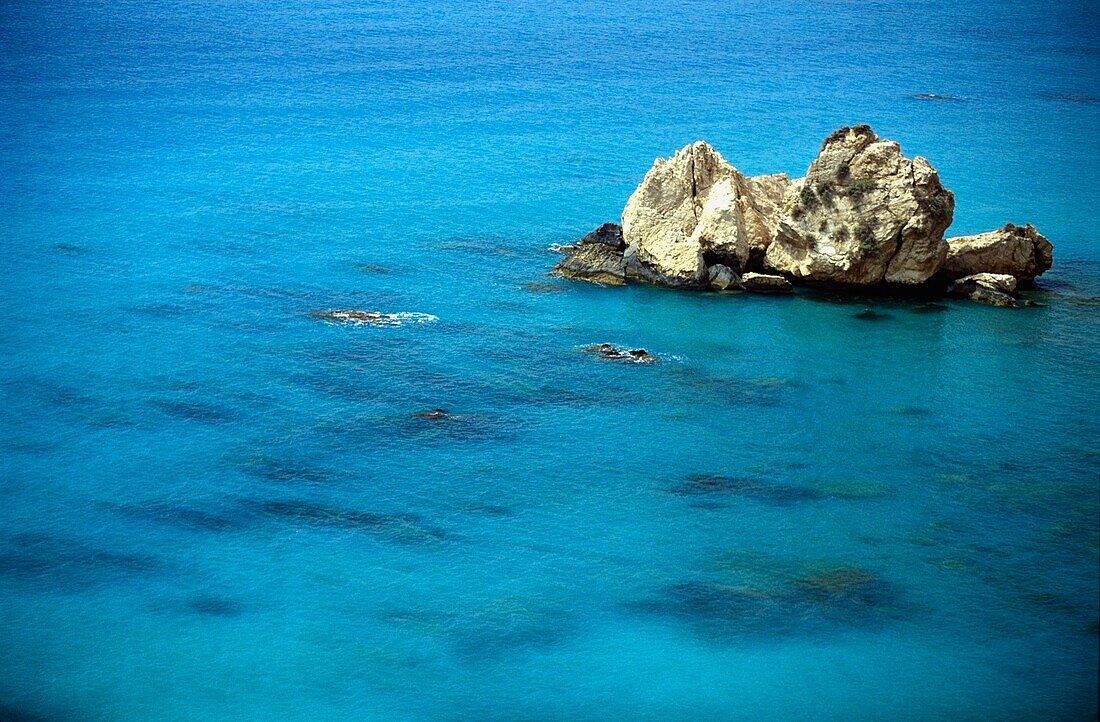 Rcok Formation Standing Out Of Turquoise Water