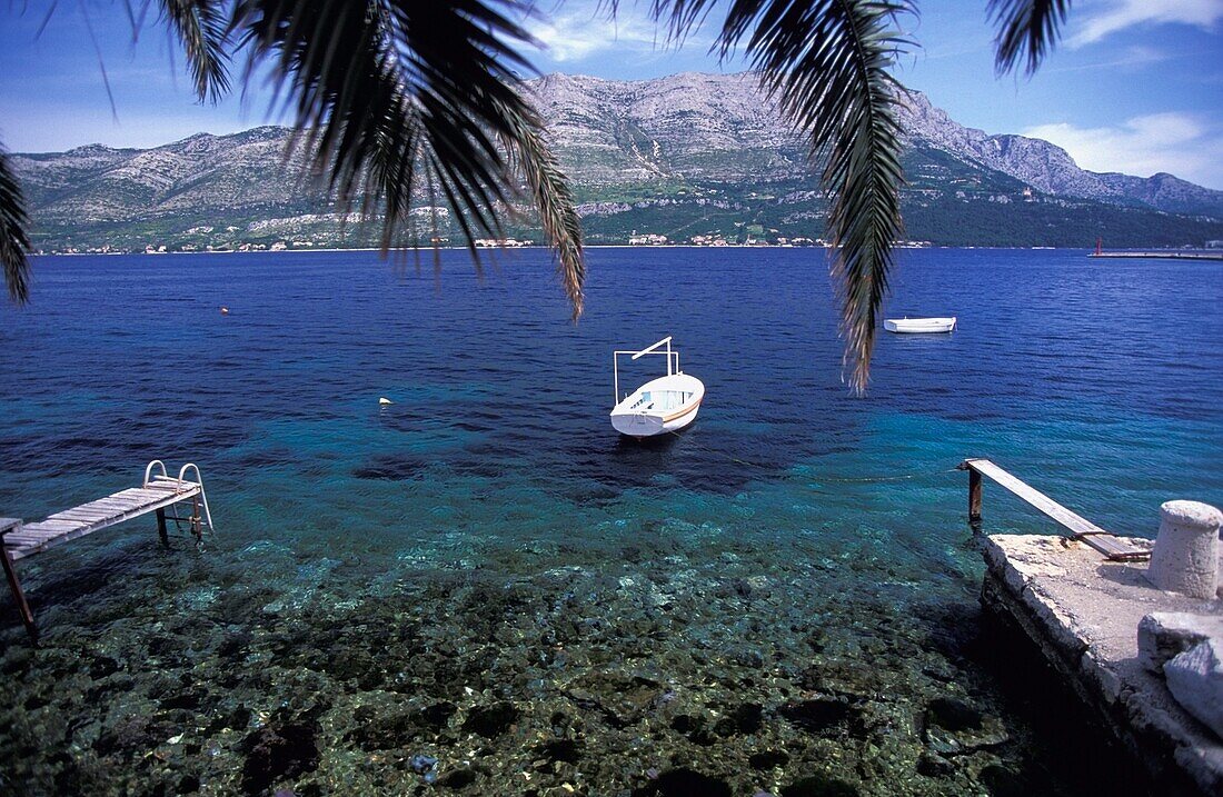 Idyllic View Of Bay With Crystal-Clear Water