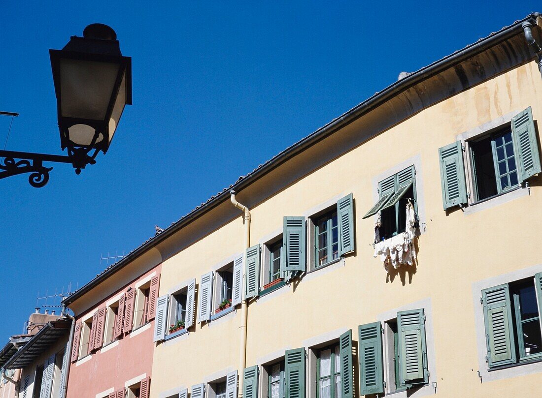 Painted Houses And Street Lamp In The Old Town