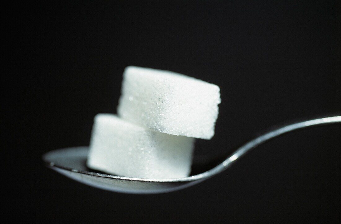 Detail Of Sugar Cubes On Spoon