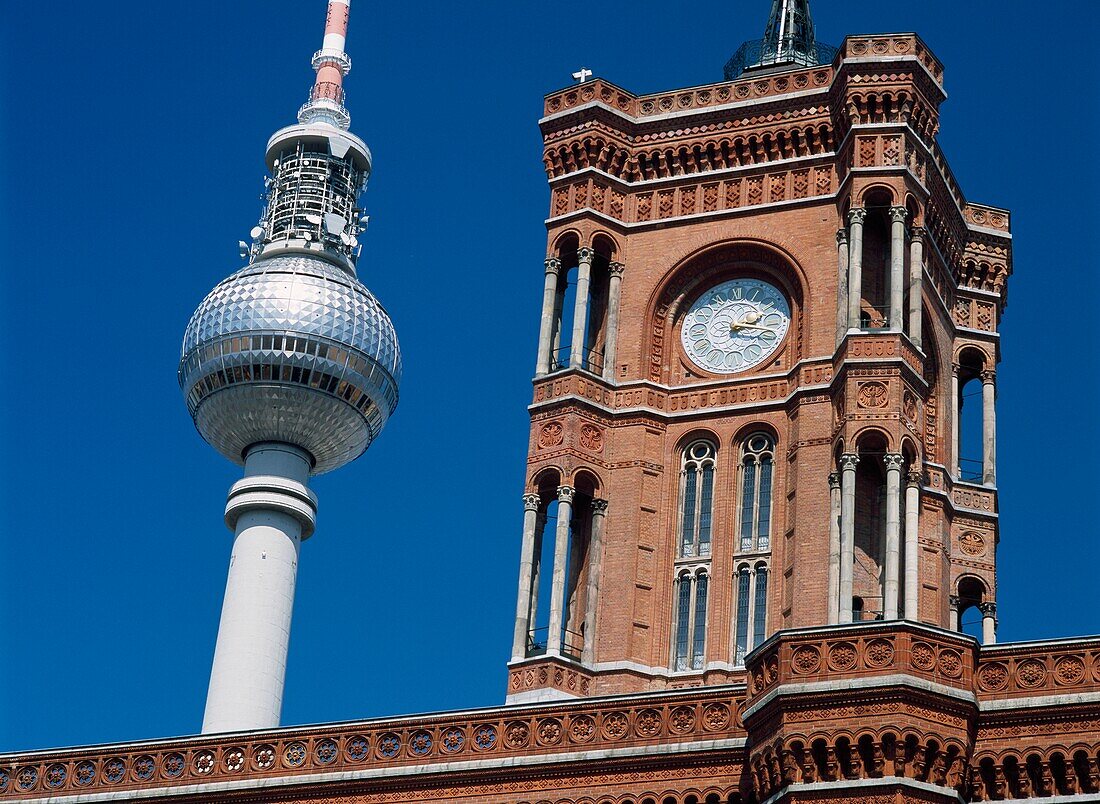 Clock Tower Of Old Building And Fernsehturm