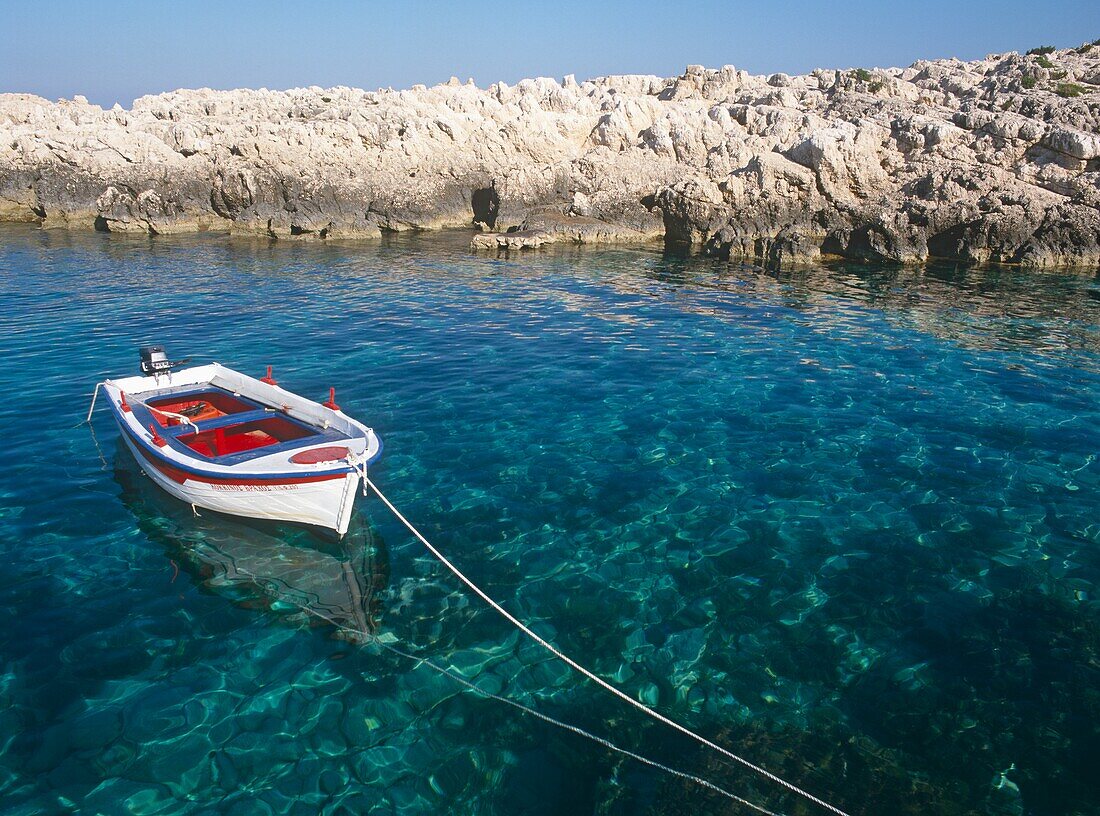 Fishing Boat Moored Off Alikes Beach