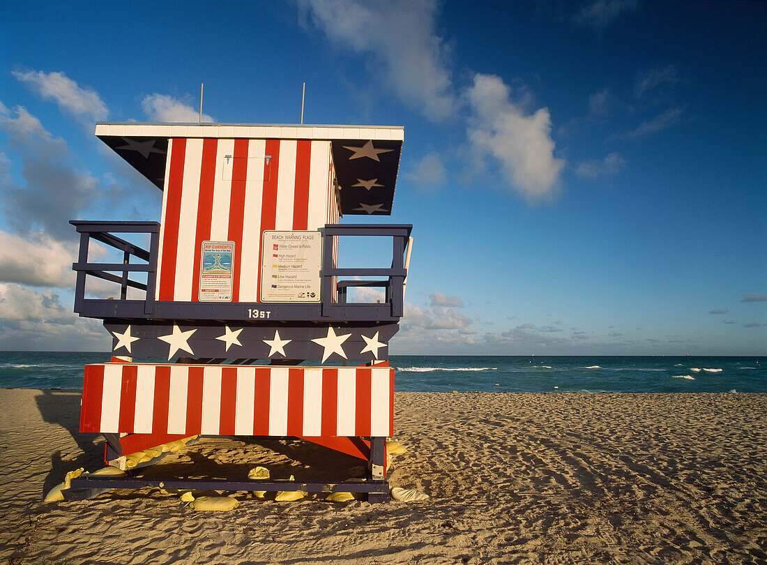 Lifeguard Tower At Dusk Painted In Stars And Stripes Design