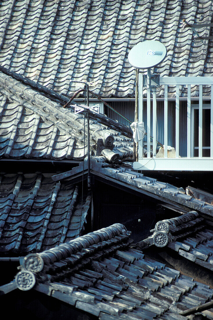 Satellite Dish On Traditional Rooftops, Close Up