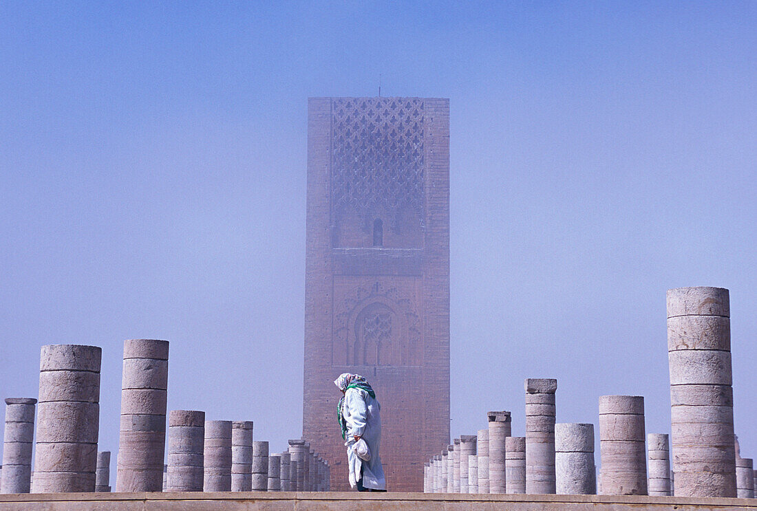 Veiled Woman Walking Infront Of Hassan Mosque