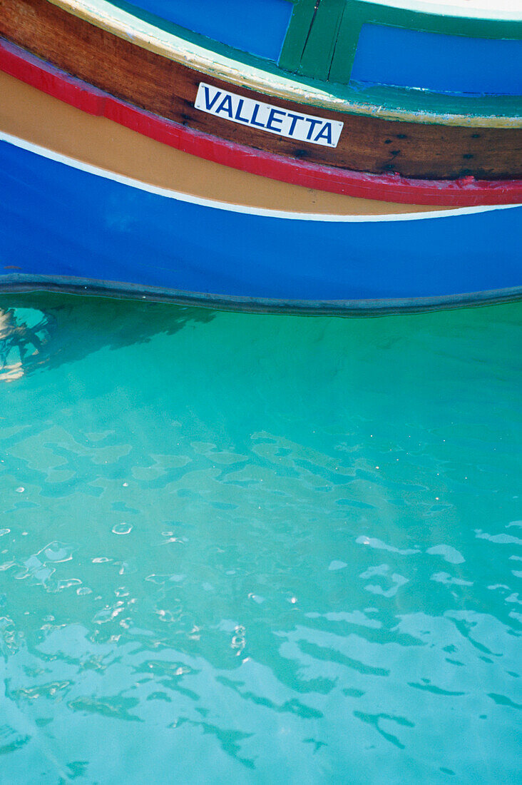 Colorful Painted Boat In Harbor In Malta, Close-Up