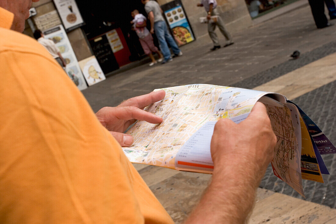 Man Looking At A Street Map