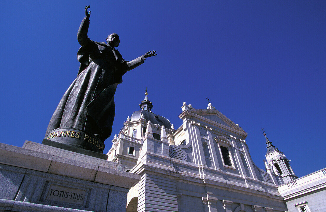 Iglesia De La Almudena And Statue