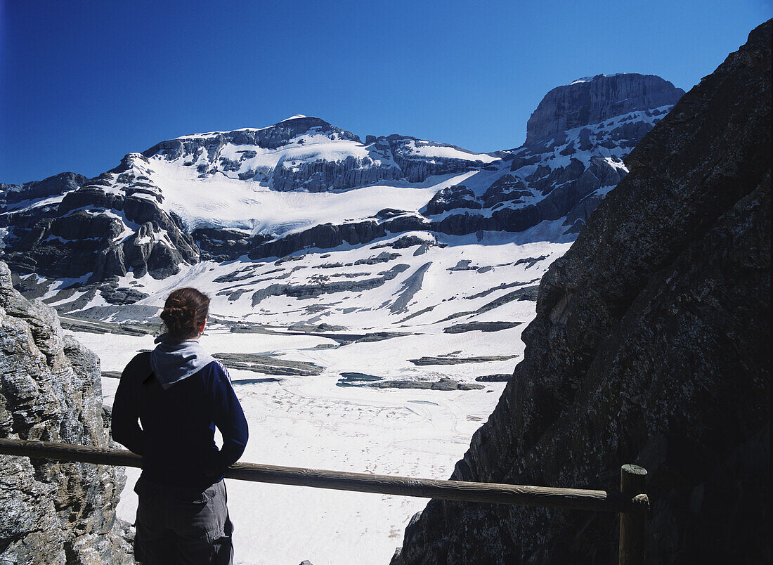 Walker Looking Out From Refuge De Breche De Tuquerouye Towards Mount Perdido