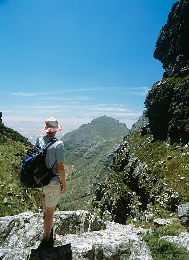 Woman Walking Up The Platteklip Gorge To The Top Of Table Mountain