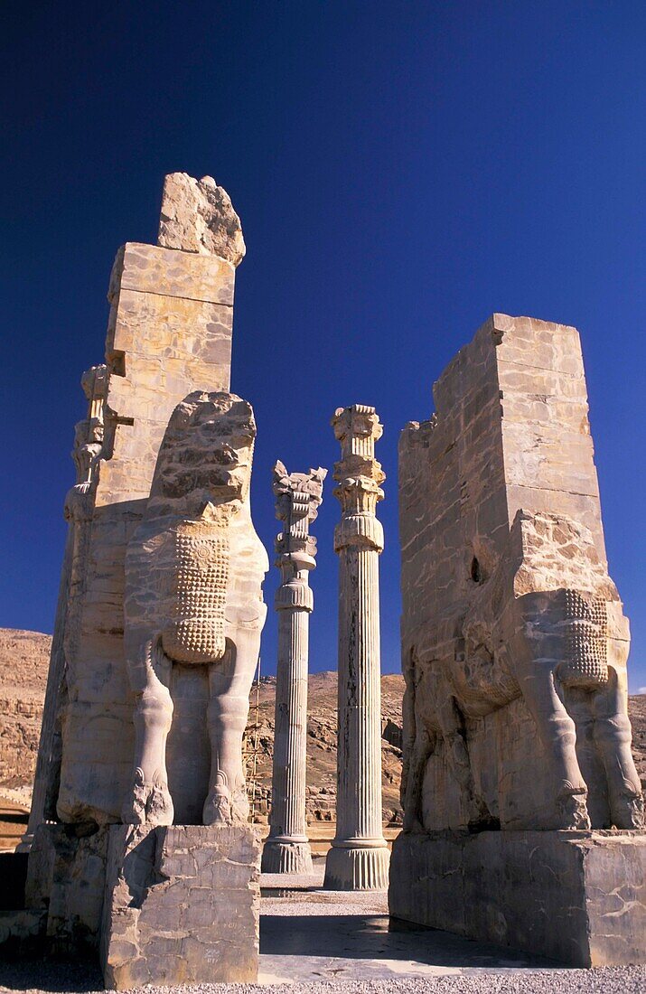 Columns And Statues At Xerzes Gateway At Persepolis