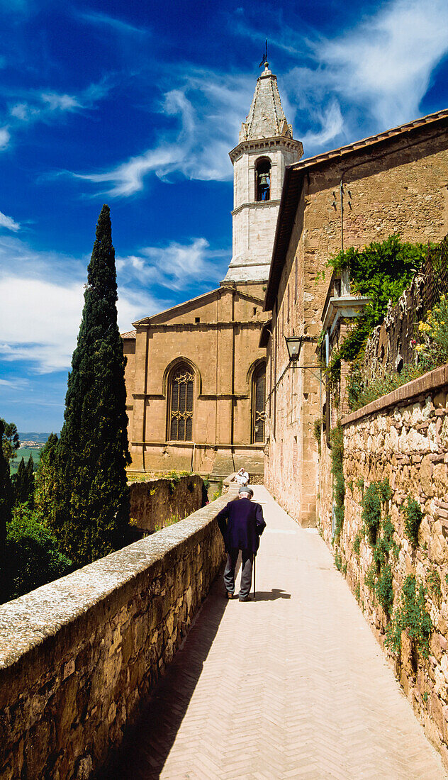 Man Walking Down Alley To Church