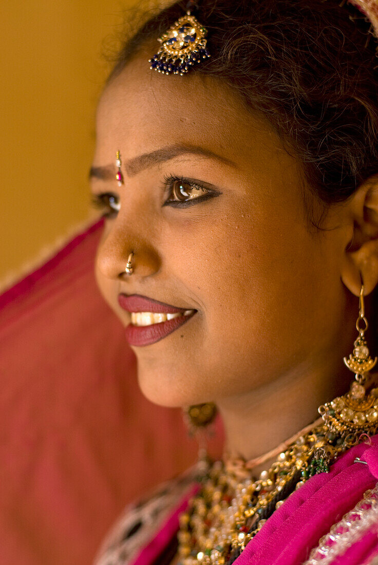 Woman In Traditional Rajasthani Sari And Jewellery, Side View