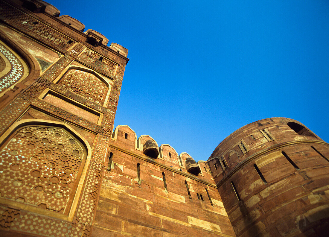 Low Angle View Of The Red Fort At Dusk.