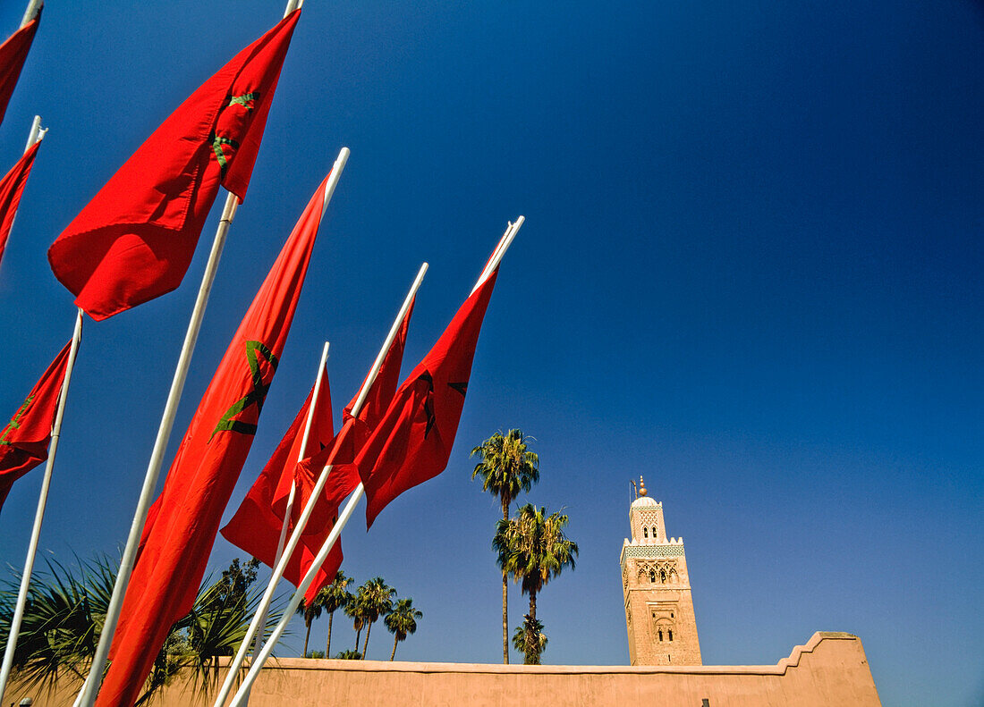 Maroccan Flags In Front Of Koutoubia Mosque