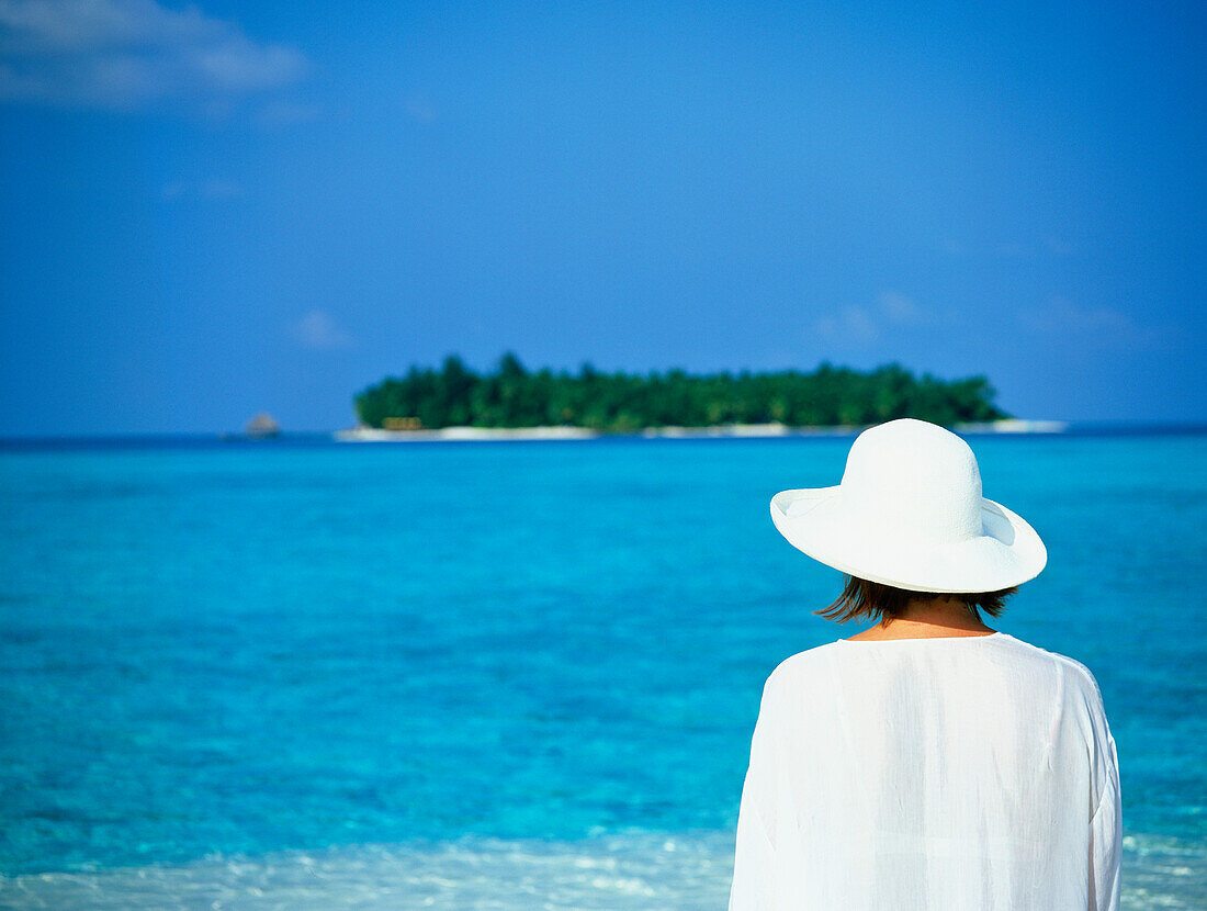 Woman On White Sand Beach Lagoon