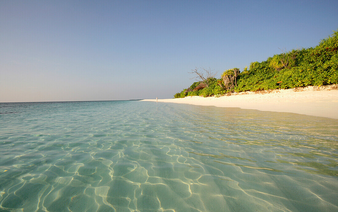 Clear Water At White Sand Beach.