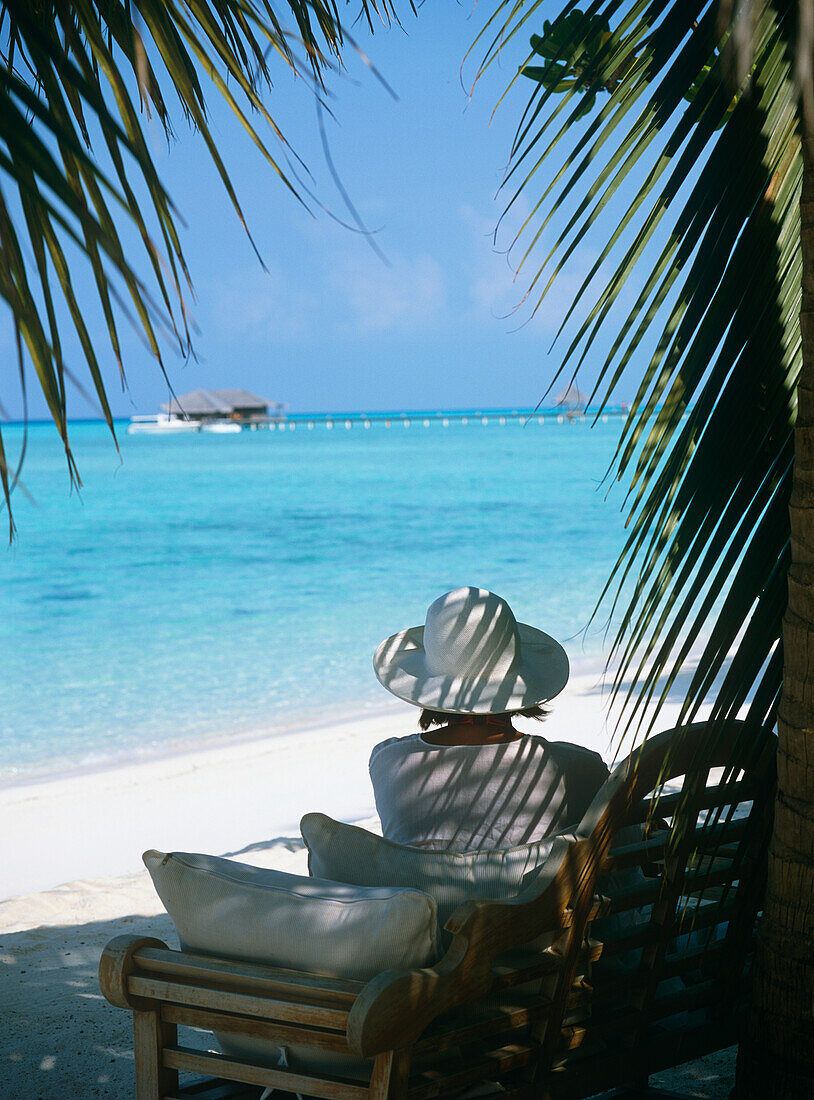 Woman On Chair On Beach