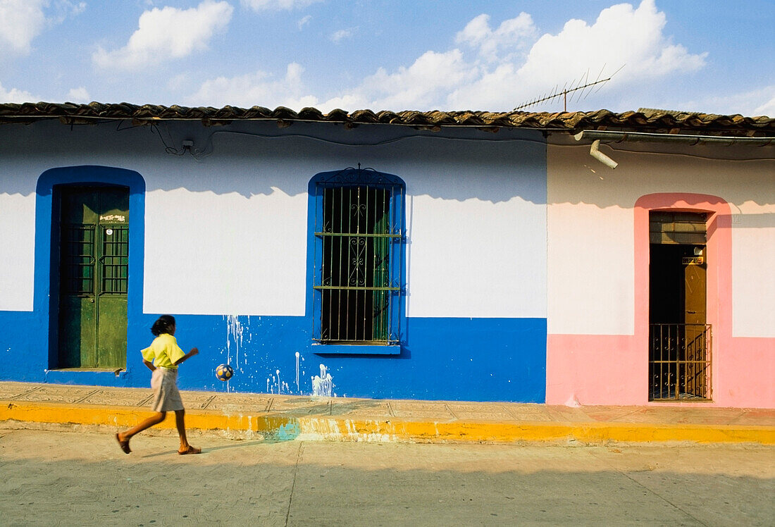 Girl Playing In Street