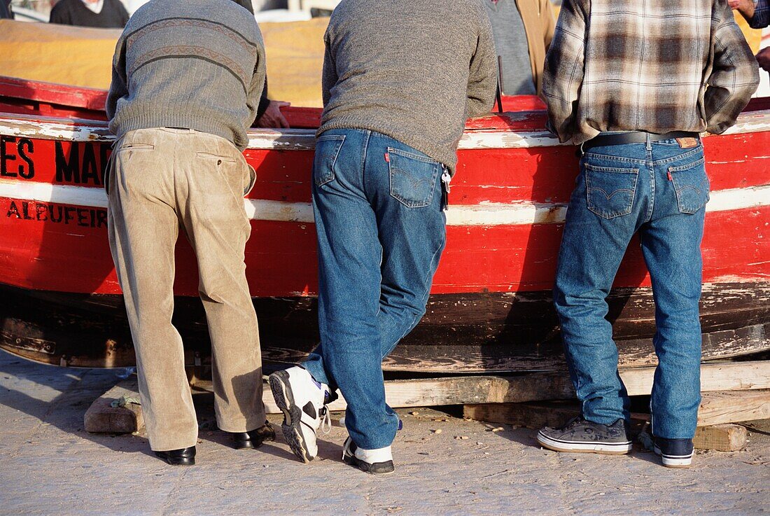 Men Standing Next To Boat, The Algarve