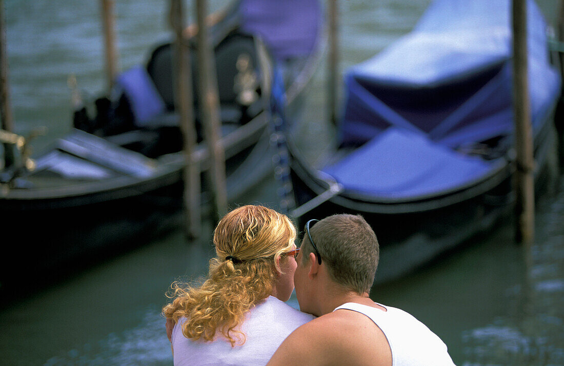 Couple Sitting Beside Grand Canal