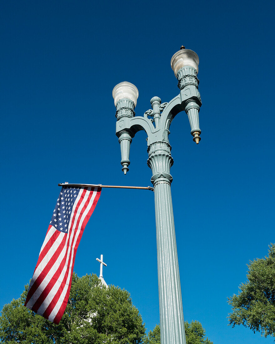 American Flag And Church, Downtown District Of  Aspen; Aspen, Colorado, United States Of America