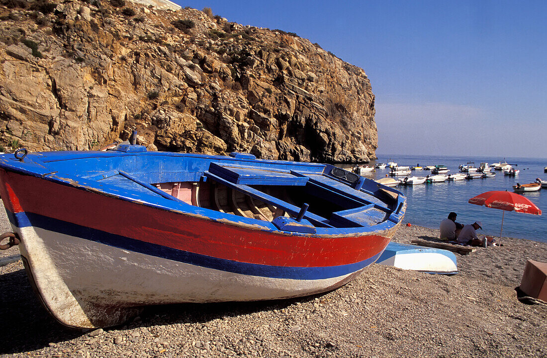 Fishing Boats On Beach By Cliff