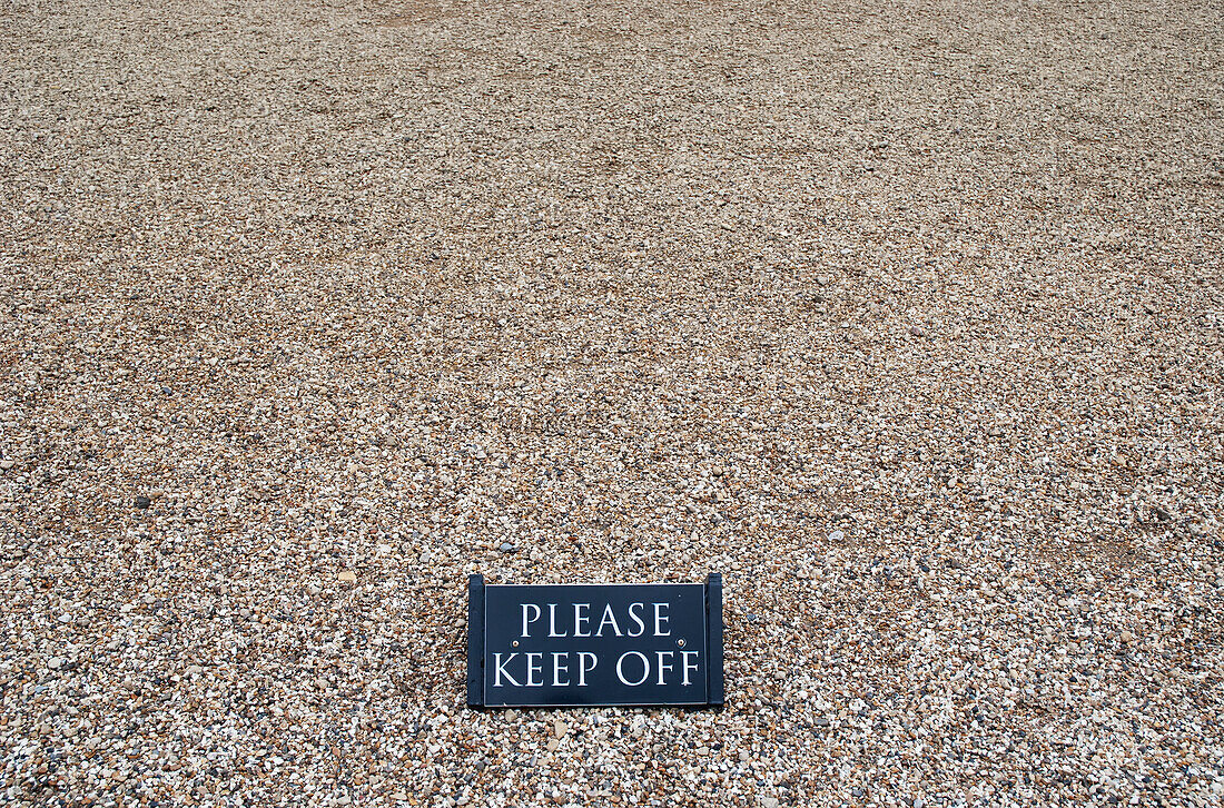 Keep off sign over pebbles at blenheim palace; Woodstock, oxfordshire, england