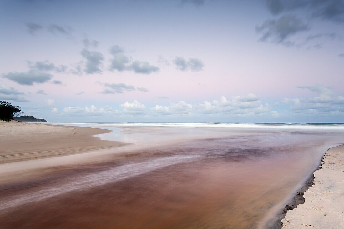 Tallows creek running out into the ocean at a spot known as dolphins at tallows beach after heavy storms; Byron bay new south wales australia