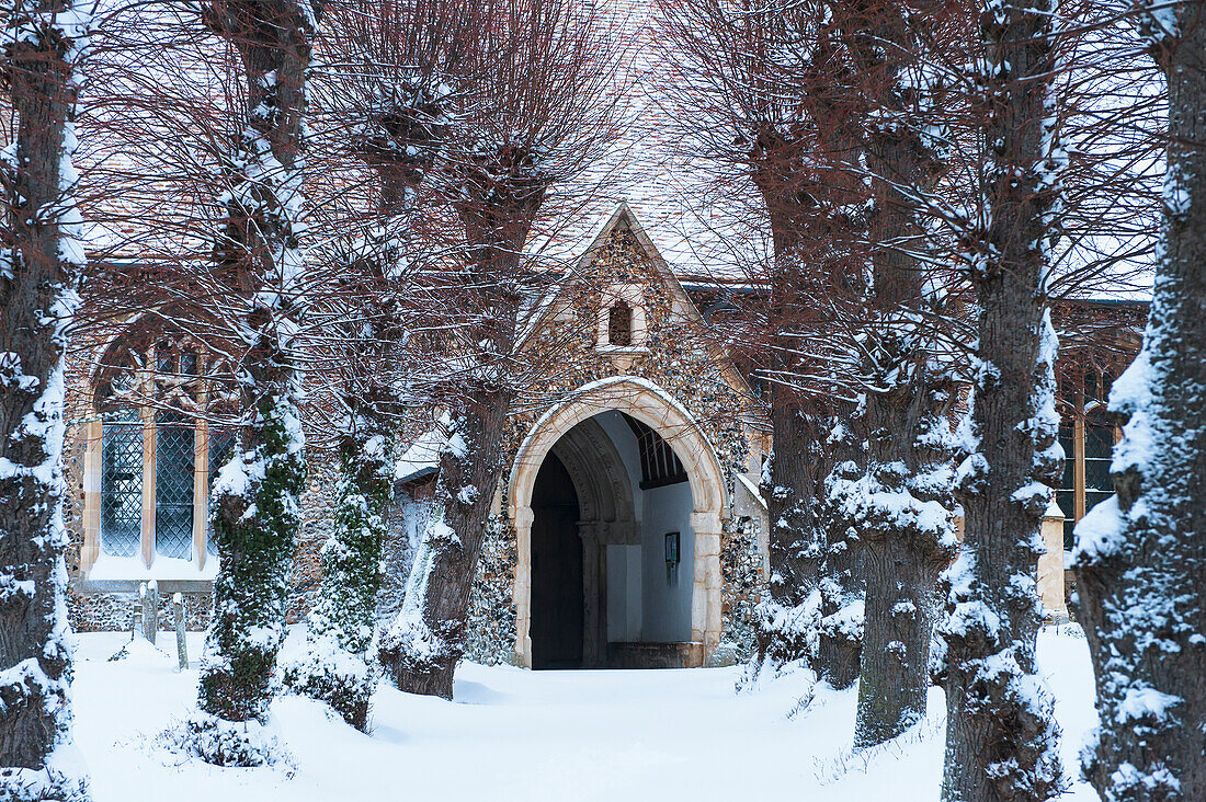 Path leading to a church in the snow; Great wilbraham cambridgeshire england