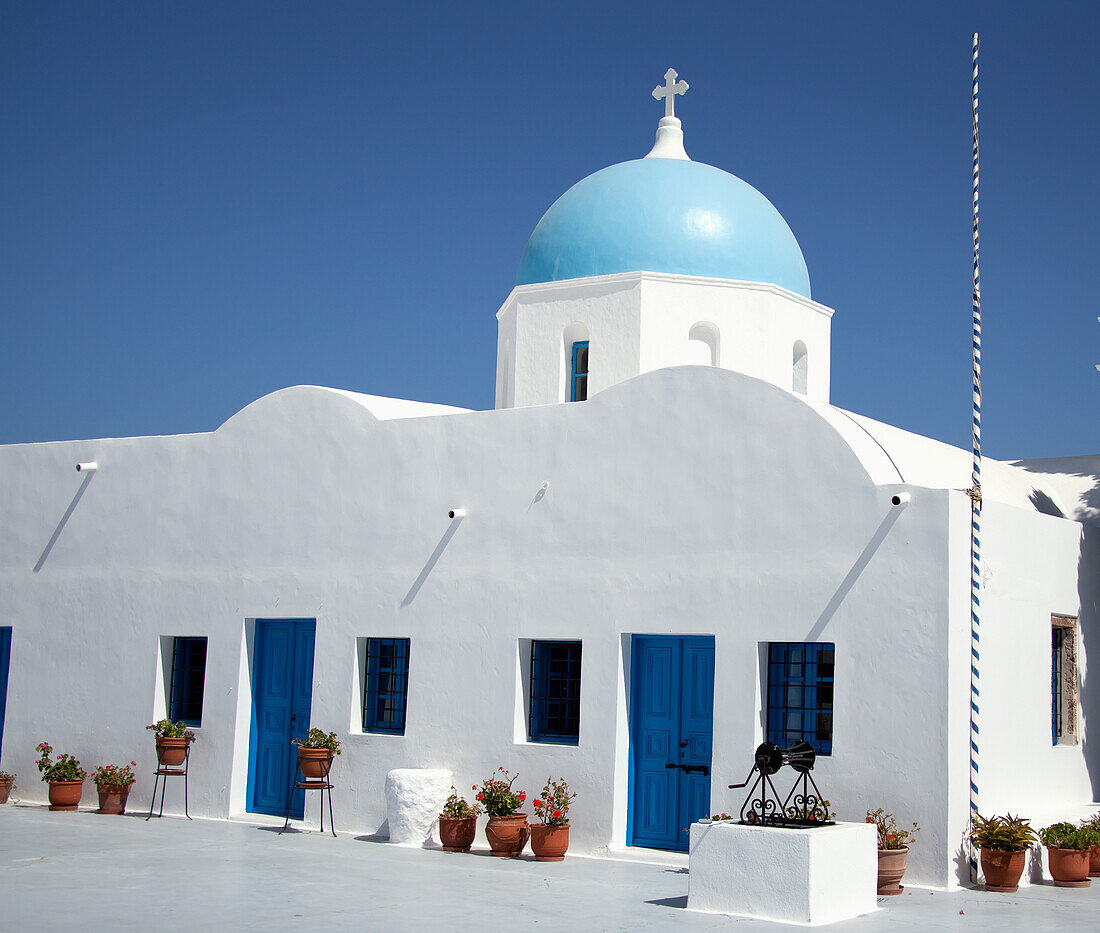 Cycladic church in traditional santorini blue & white; Imerovigli cyclades greece