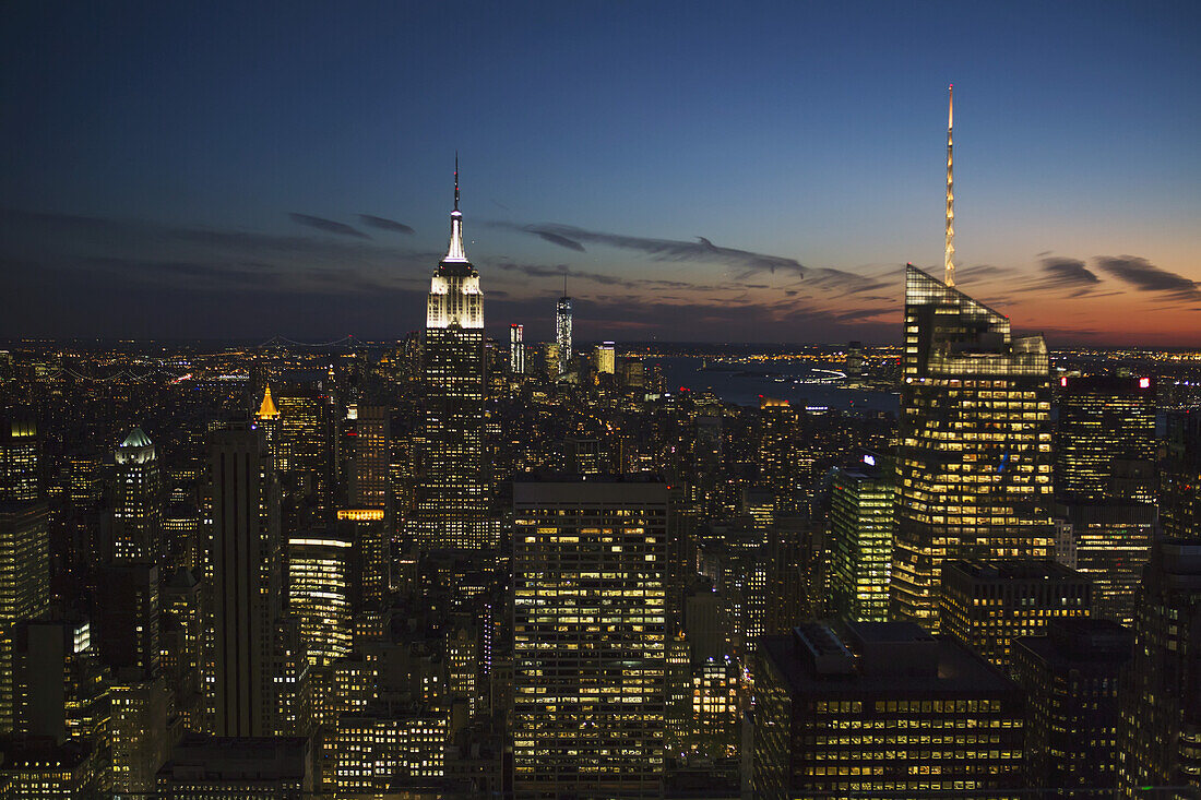 New York City Buildings Illuminated At Nighttime; New York City, New York, United States Of America