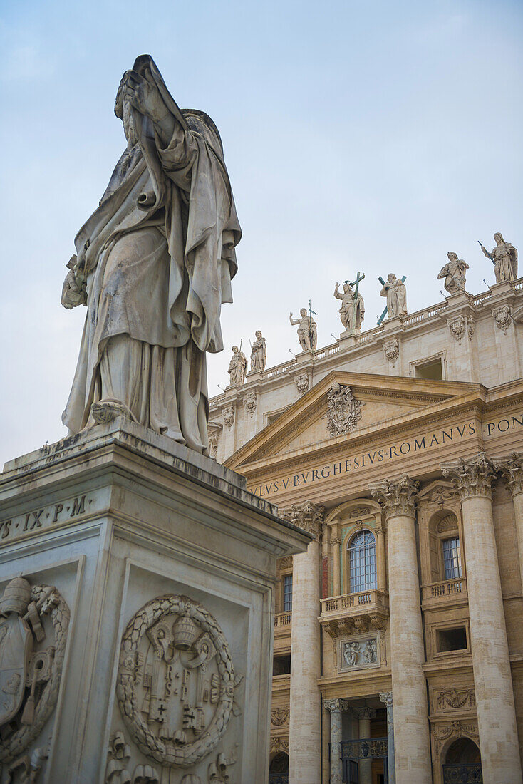 Statue And St. Peter's Basilica; Rome, Lazia, Italy