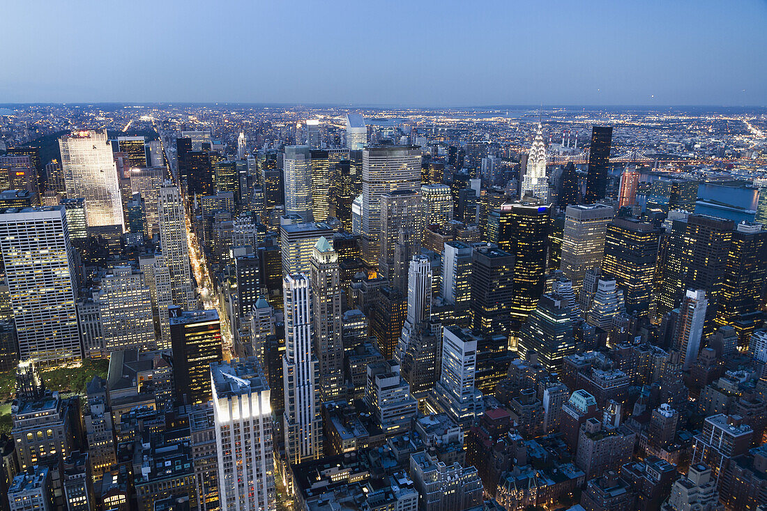 Panoramic View Of The Skyscrapers And The East River At Dusk, As Seen From The Empire State Building, New York City, New York, United States