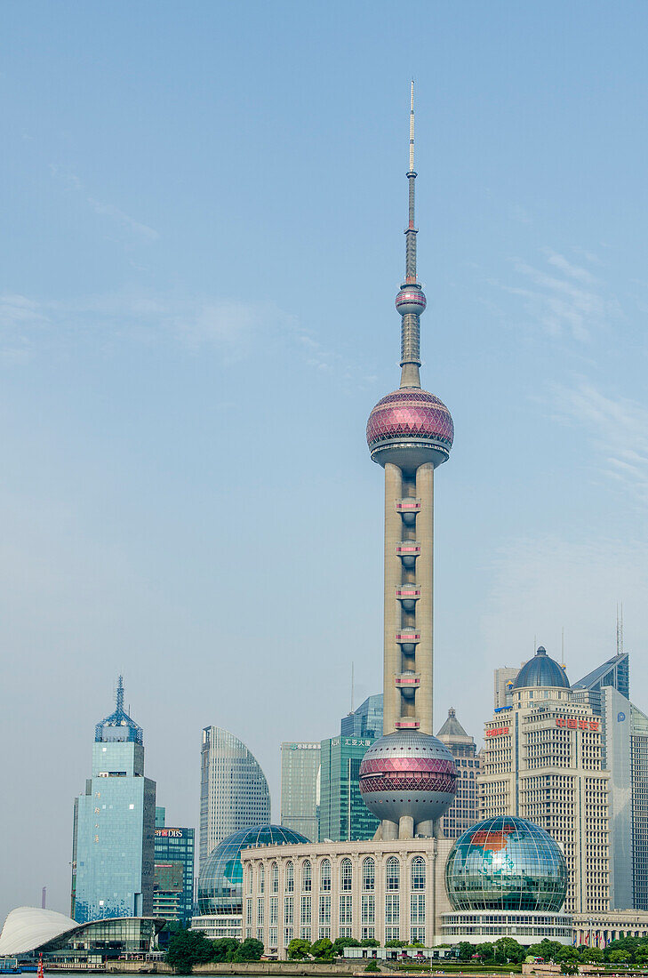 Pearl Tower over Pudong district skyline Shanghai, China.