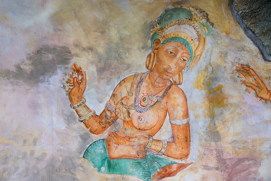Sri Lanka, Sigiriya, ancient Rock Fortress dating back to the first millennium. Fresco of 'The Maidens of the Clouds' (museum reproduction) UNESCO World Heritage Site.