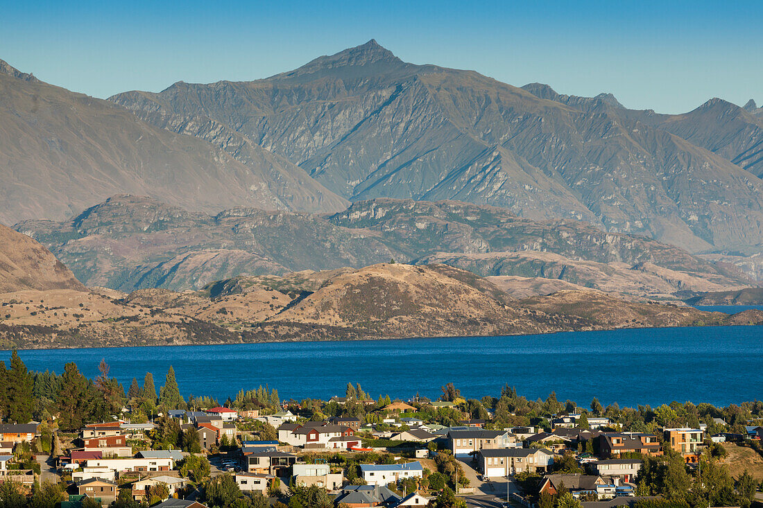 New Zealand, South Island, Otago, Wanaka, elevated town view from Mt. Iron, morning