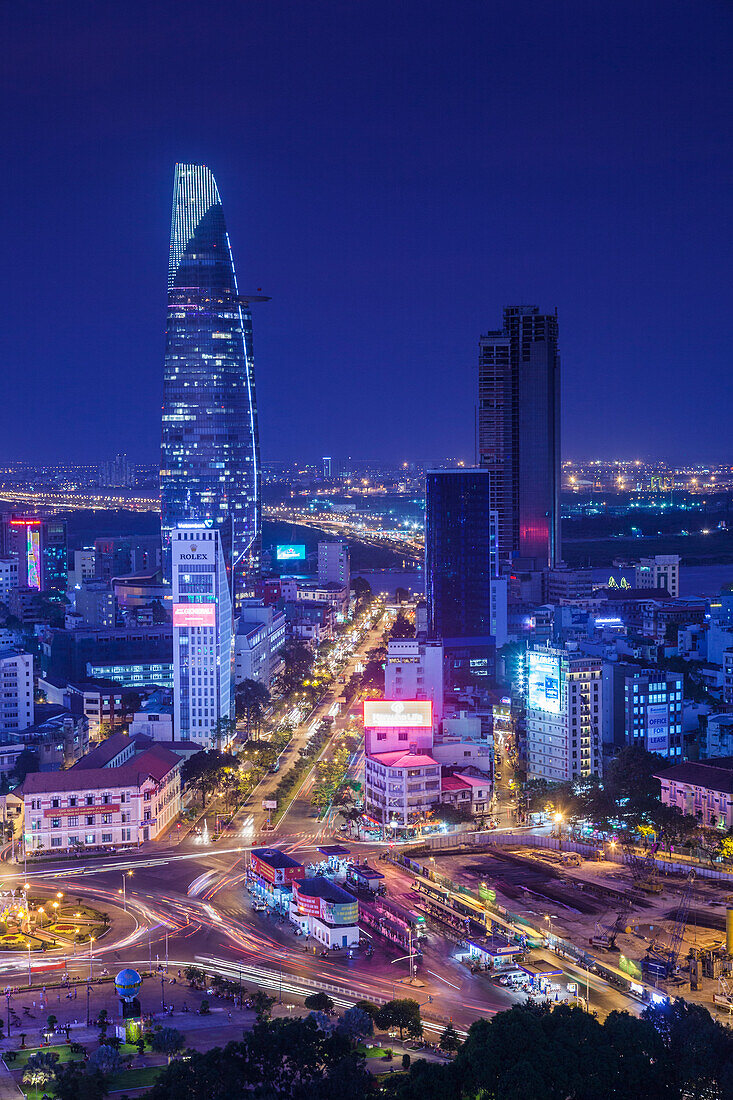 Vietnam, Ho Chi Minh City. Elevated city view above Quach Thi Trang Circle, dusk