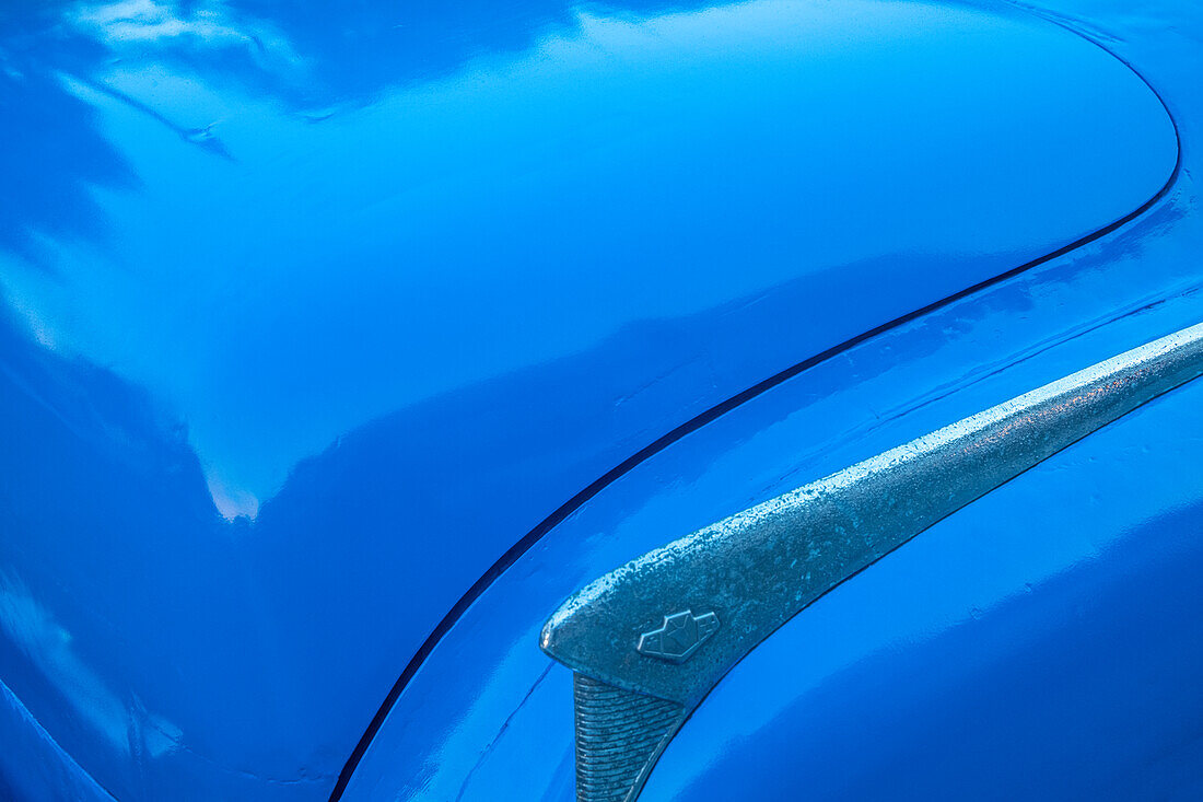 Detail of trunk and fender on blue classic American Buick car in Habana, Havana, Cuba.