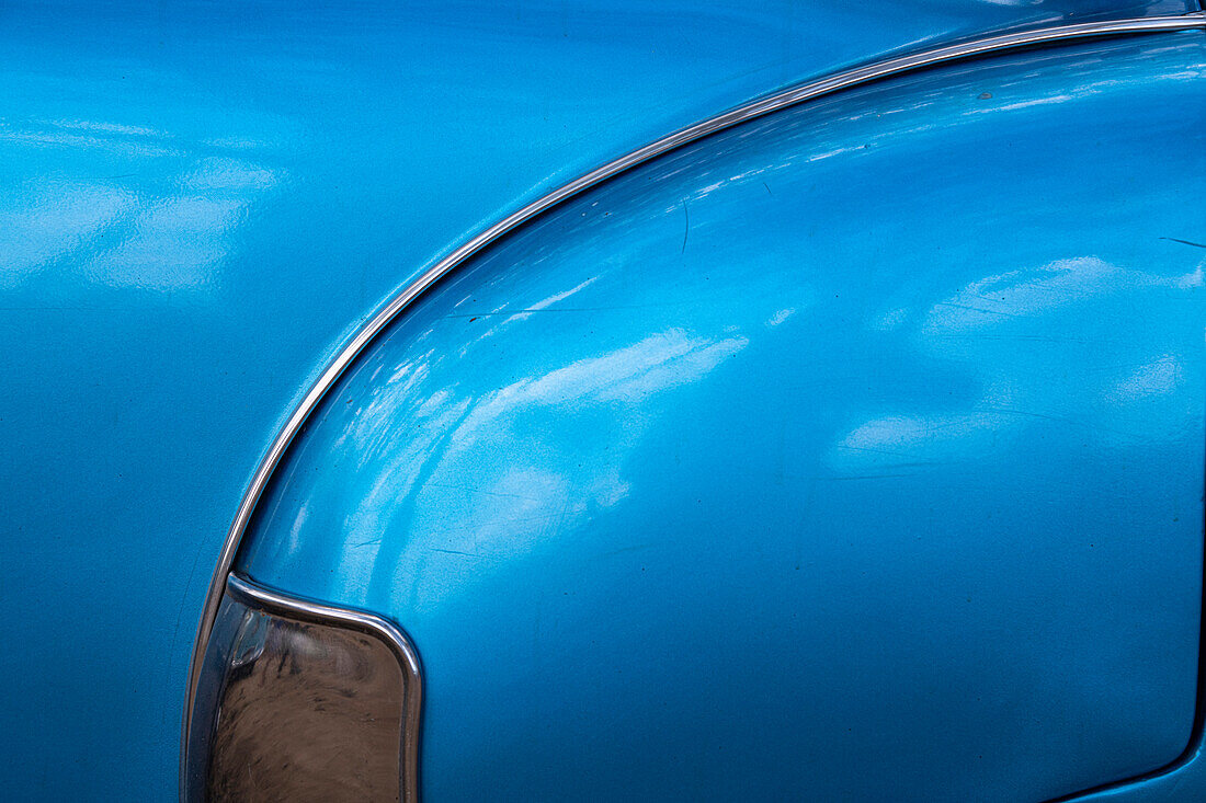 Detail of rear fender on classic blue American Chevrolet in Vinales, Vinales Valley, Cuba.
