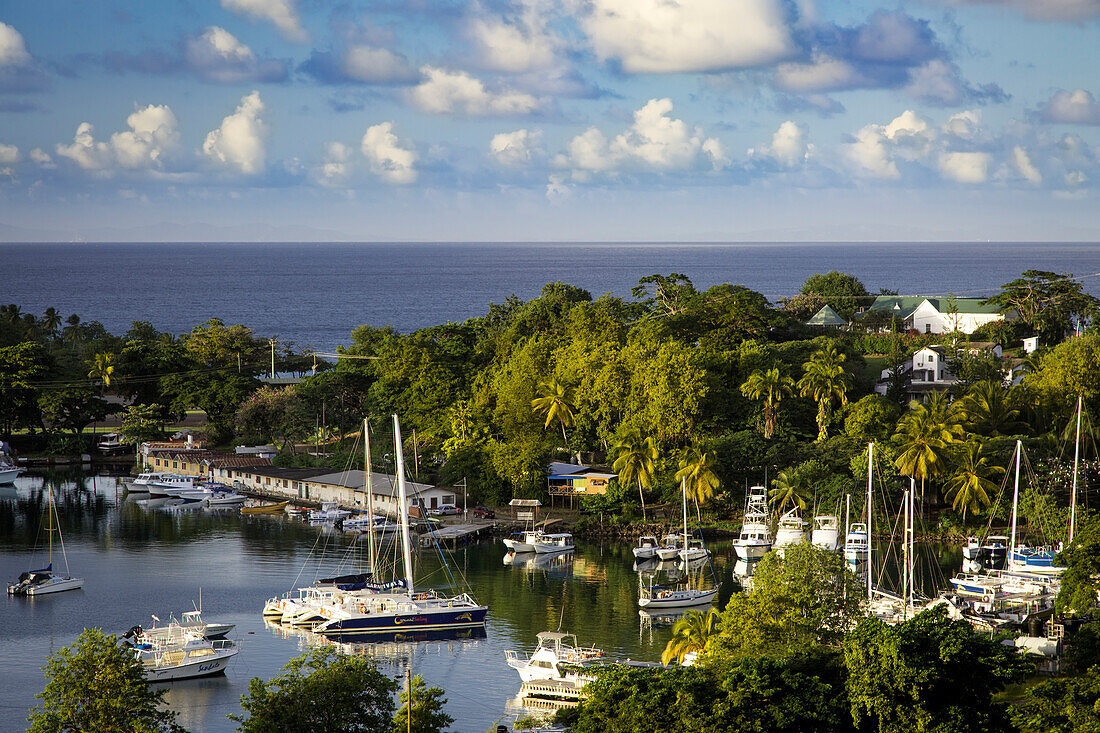 Setting sun over the tiny harbor in Castries, St. Lucia, West Indies