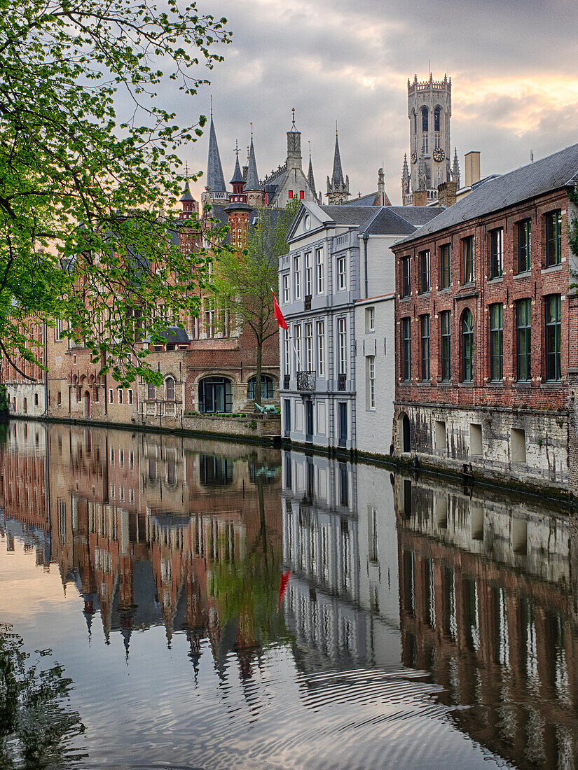 Belgium, Brugge, West Flanders, Canal Scene with homes and Bridge