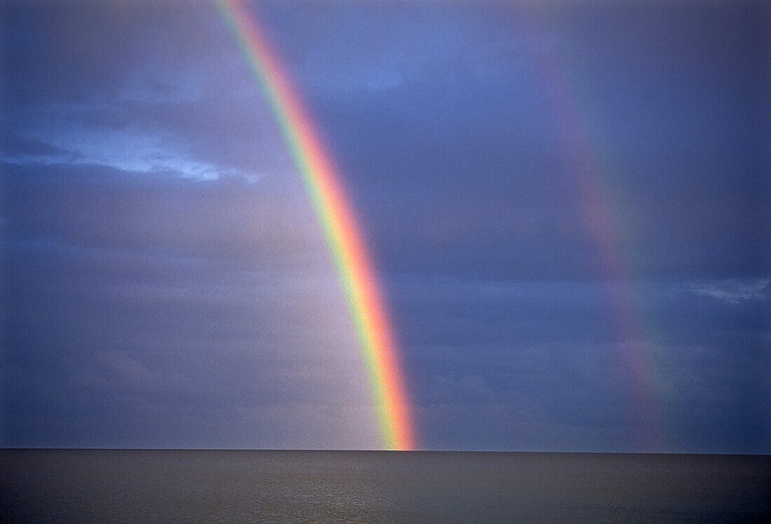 Canada, Manitoba, Winnipeg. Rainbow on Lake Winnipeg after storm.